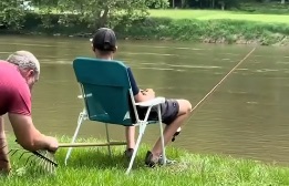 When a playful prank on the young fisherman is too hard to resist