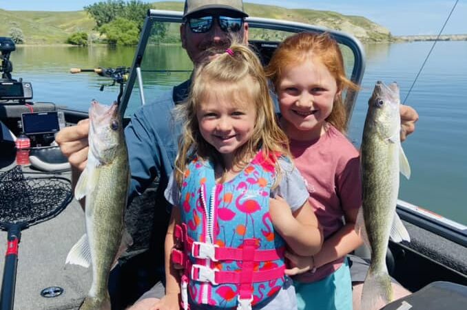 Youngsters reeling in the walleye